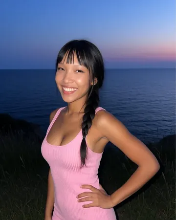 Jade by the sea at dusk, ribbed pink dress