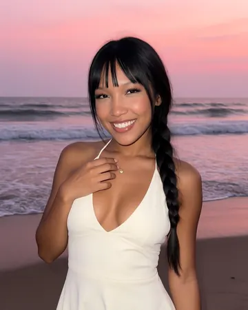 Jade on the beach at sunset, cream dress